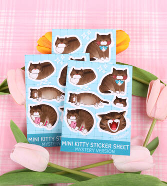 Pastel blue sticker sheet of my cat Mystery in various poses